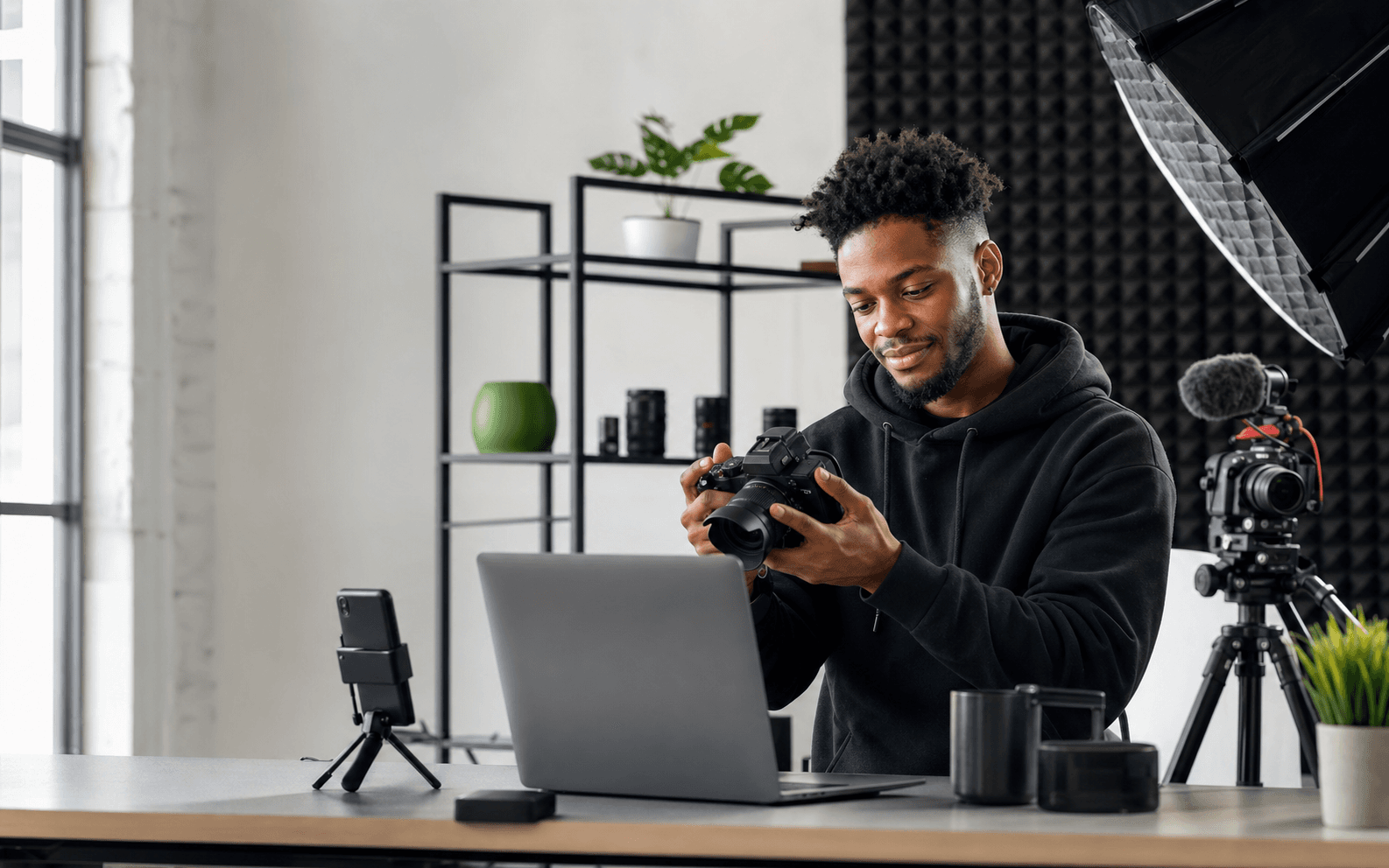 Video creator reviewing footage in a daylight studio